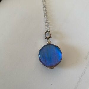 Sterling silver locket with butterfly wing